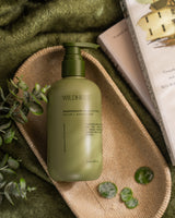 Wildheke body lotion with Olive and Kawakawa in a natural lifestyle setting