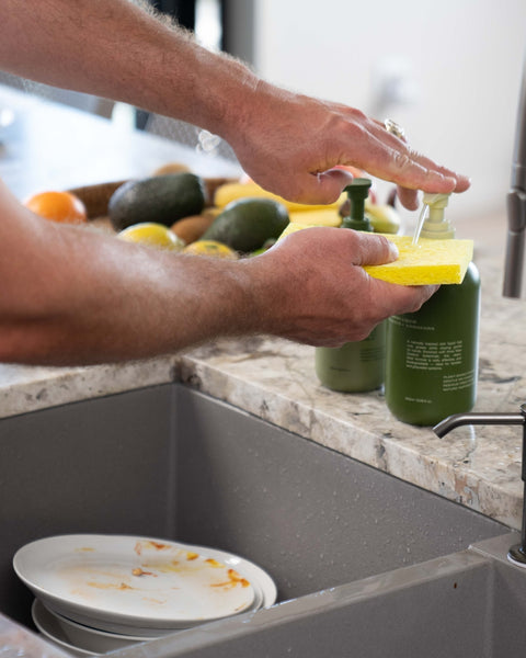 Wildheke Kitchen Essentials set with hand wash and dishwash liquid in a modern kitchen