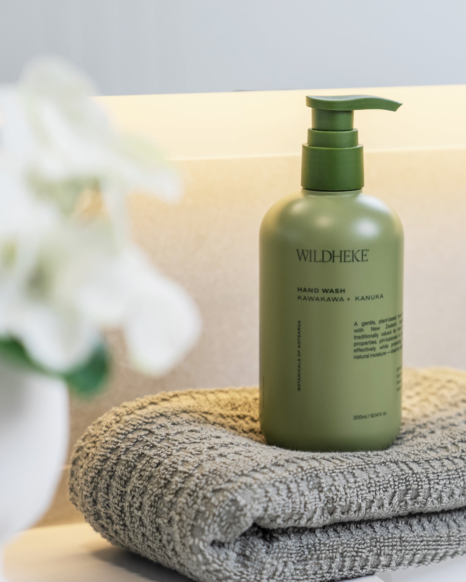 Wildheke plant-based hand wash displayed with bathroom essentials