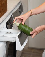 Wildheke laundry liquid with Horopito and Kawakawa in a natural home setting